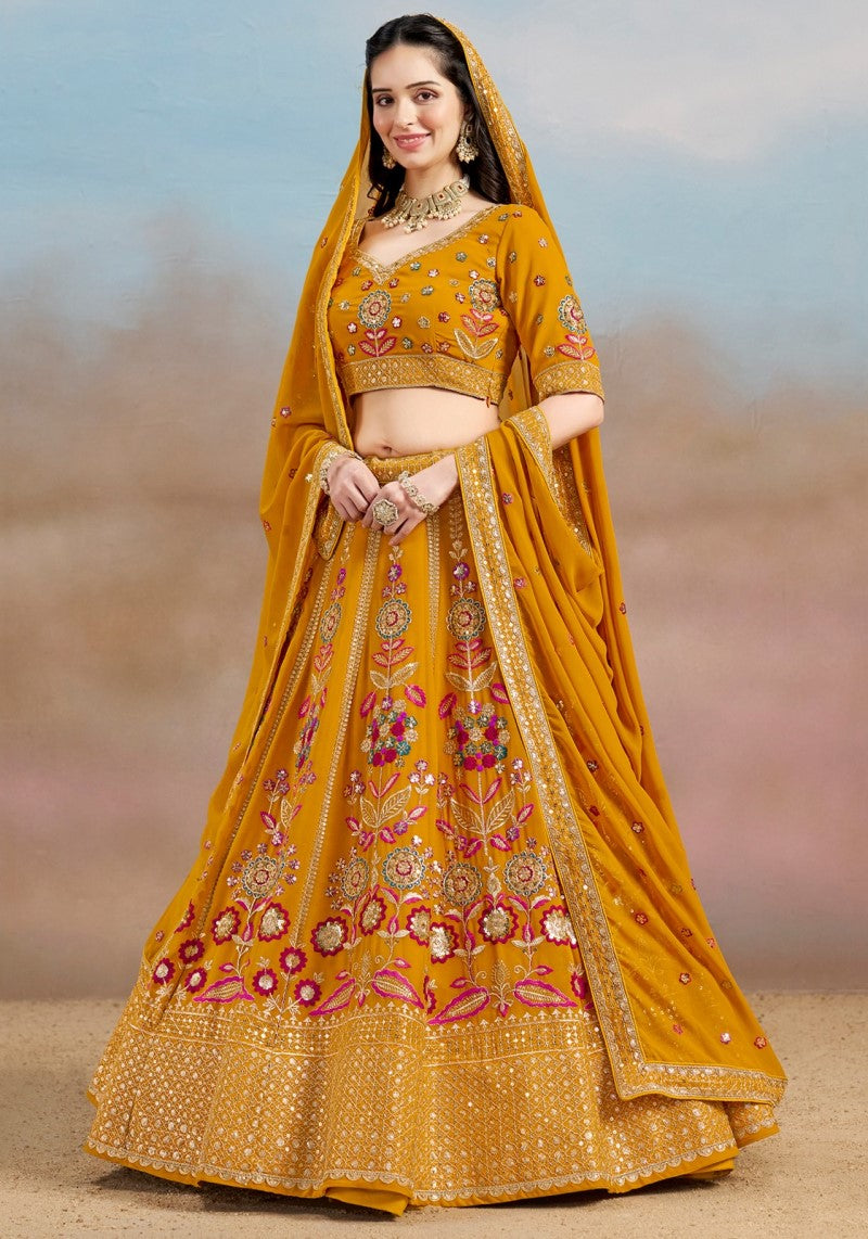 Left side view of mustard yellow lehenga choli with intricate floral zari embroidery and elegant flare design