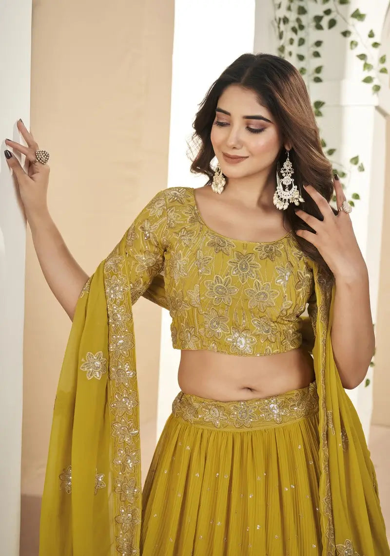 Mustard Faux Georgette Sequins Embroidered Lehenga Choli
