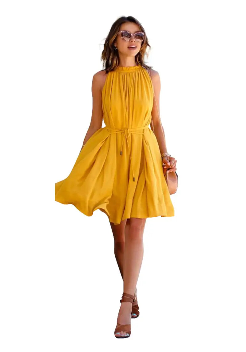 Front view of the model wearing "Yellow Western Halter Neck Pleated Short Dress" featuring sleeveless pleated mock neck dress with pocket s for a stylish look.