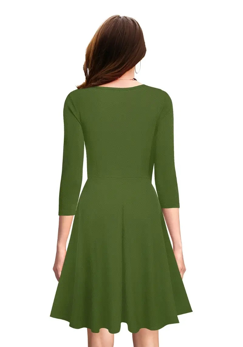 Back view of model wearing Royal Blue Fit & Flare Flounce Hem Dress with 3/4 sleeves and flared hem.