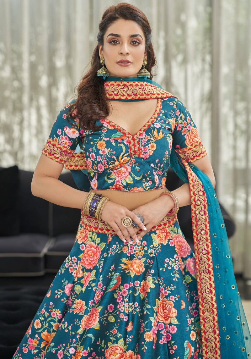 2nd close view of model wearing Teal floral art silk lehenga choli with embroidered net dupatta