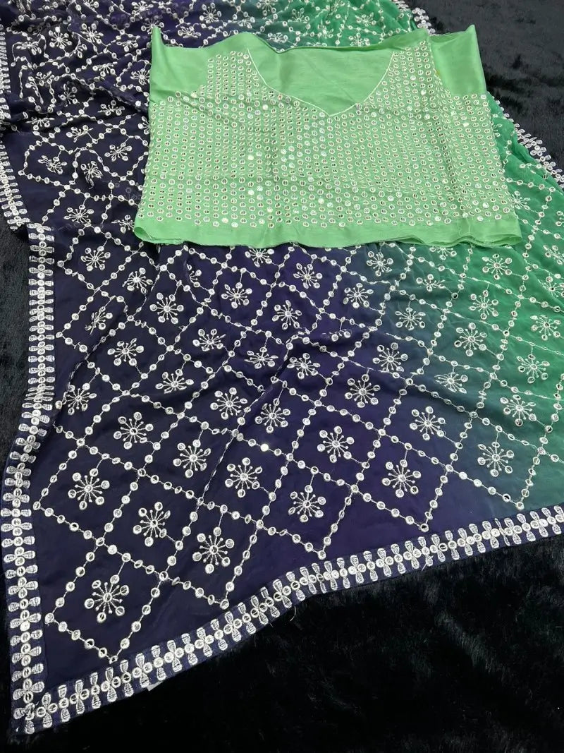 Magnificent Blue-Green Georgette Saree with Heavy Sequins