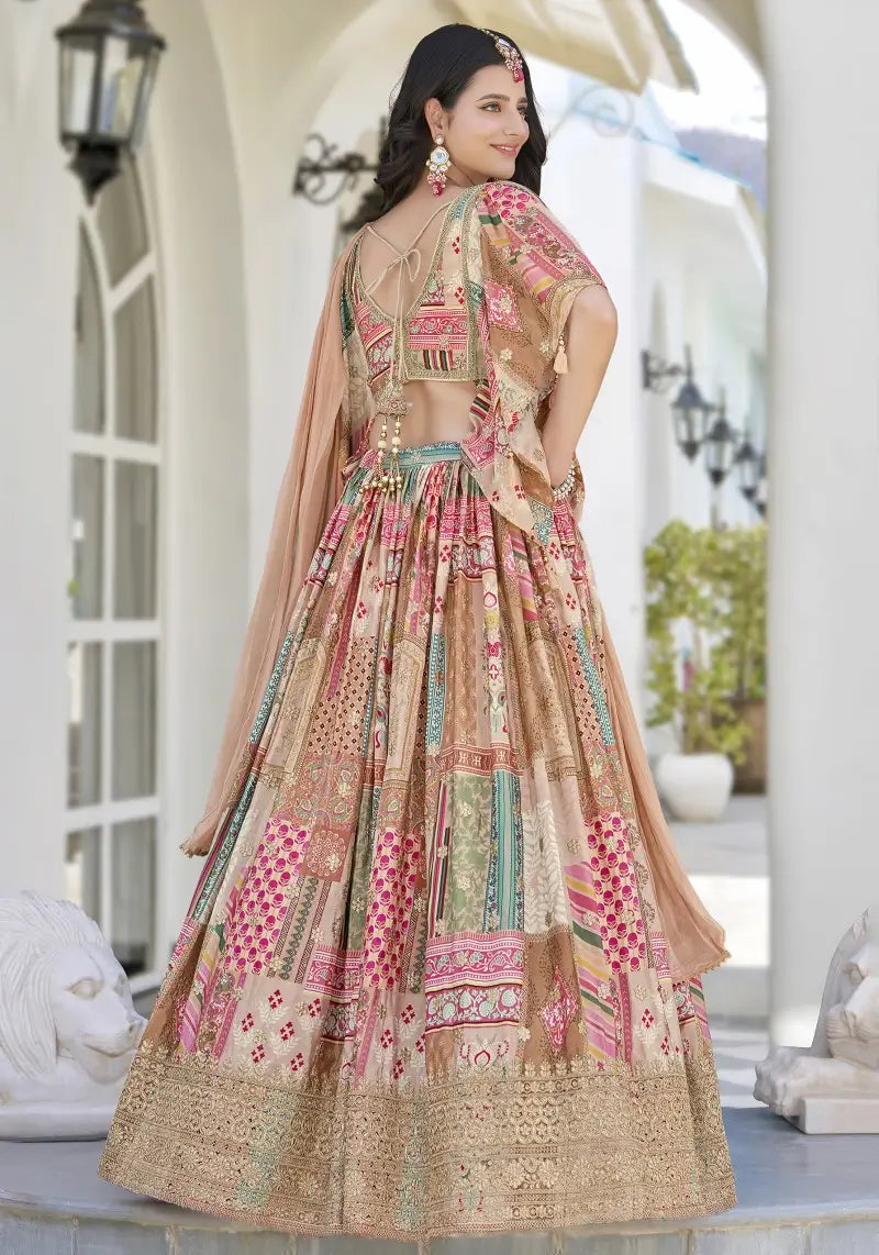 Back view of model in Beige Embroidered Lehenga Set highlighting scalloped hem blouse and chiffon dupatta