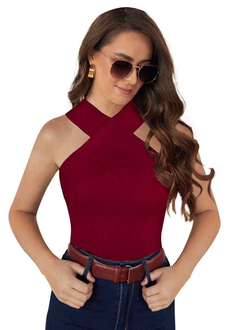 Model wearing a crimson cross halter neck sleeveless top paired with high-waist jeans, showcasing the front view.
