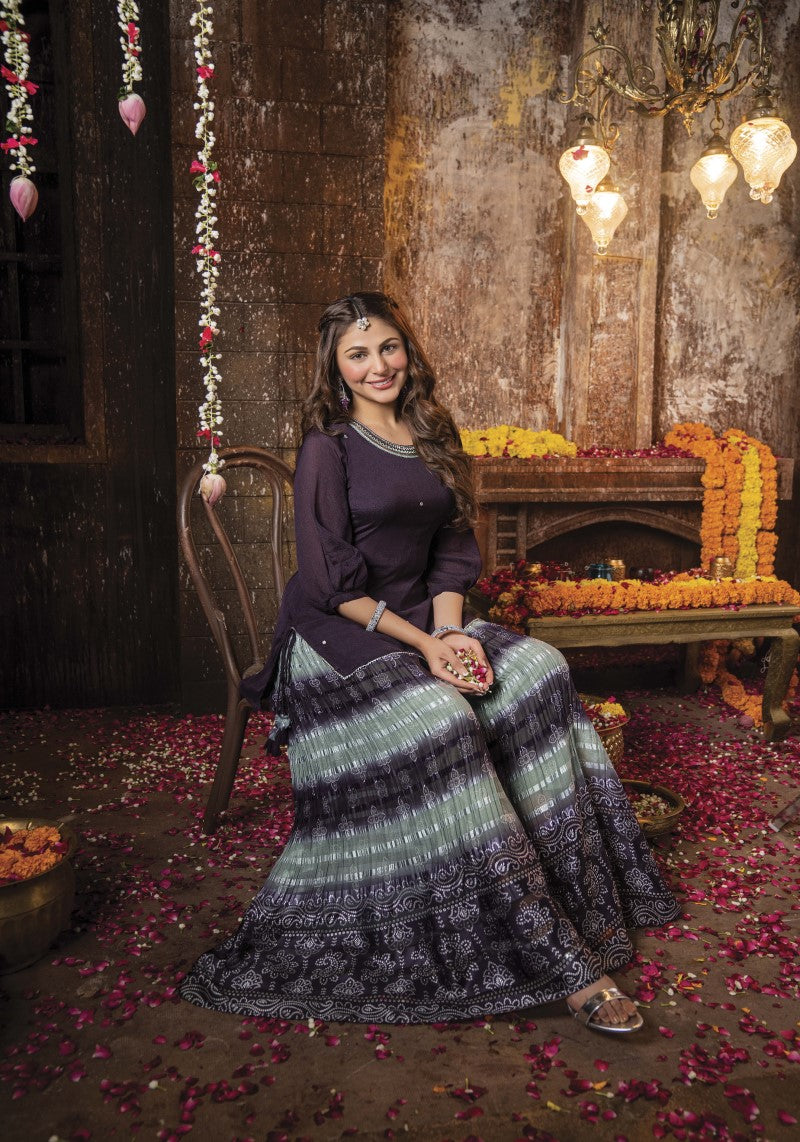 Purple Designer Kurti sitting girl