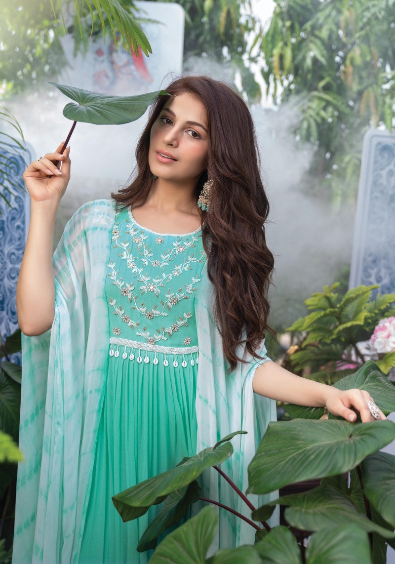 Close-up of the model wearing Sea Green Georgette Kaftan Dress showing fine embroidery and luxe fabric texture