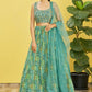 Teal Green Organza Lehenga with Mirror Zari Embroidery and Net Dupatta