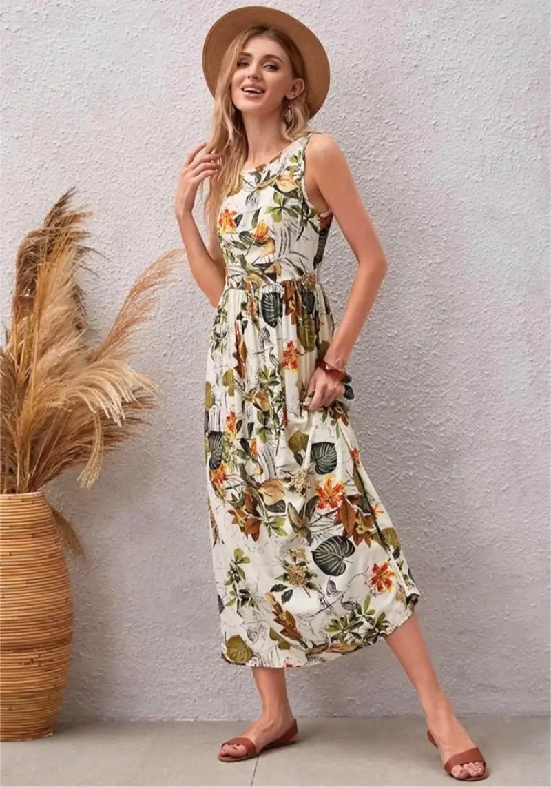 Left Side profile of model in Tropical Bloom White Floral Sleeveless Midi Dress