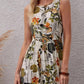 Close-up of floral print and fabric details on Tropical Bloom White Midi Dress