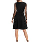 Back view of black A-line dress with sheer polka dot mesh sleeves and illusion sweetheart neckline – elegant party wear.