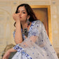 Sitting pose of model wearing White and Blue Heritage Lehenga Choli with dupatta Set.