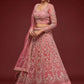 Full side view of the model showcasing Fantasy Rose soft net lehenga choli set with detailed embroidery and matching dupatta.