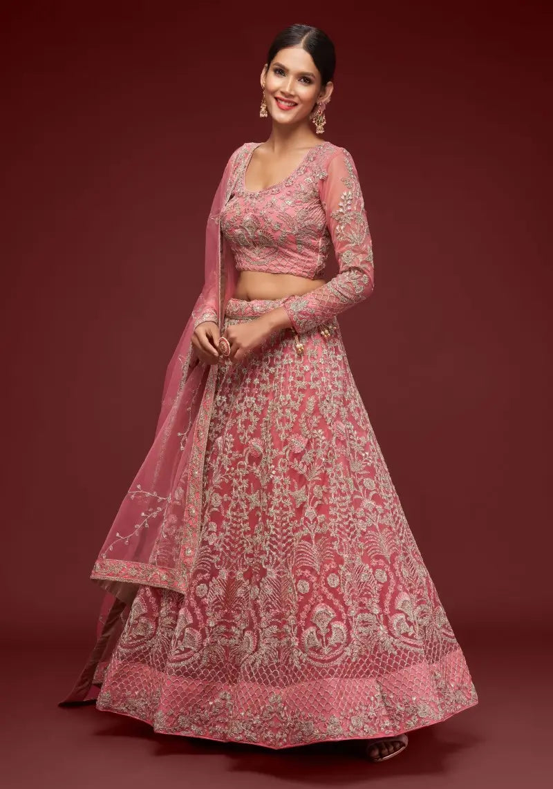 Full side view of the model showcasing Fantasy Rose soft net lehenga choli set with detailed embroidery and matching dupatta.