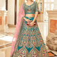 Exquisite Teal Velvet Bridal Lehenga Choli with Net Dupatta