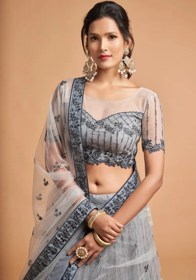 Charming Grey Soft Net Zari Embroidered Lehenga Choli