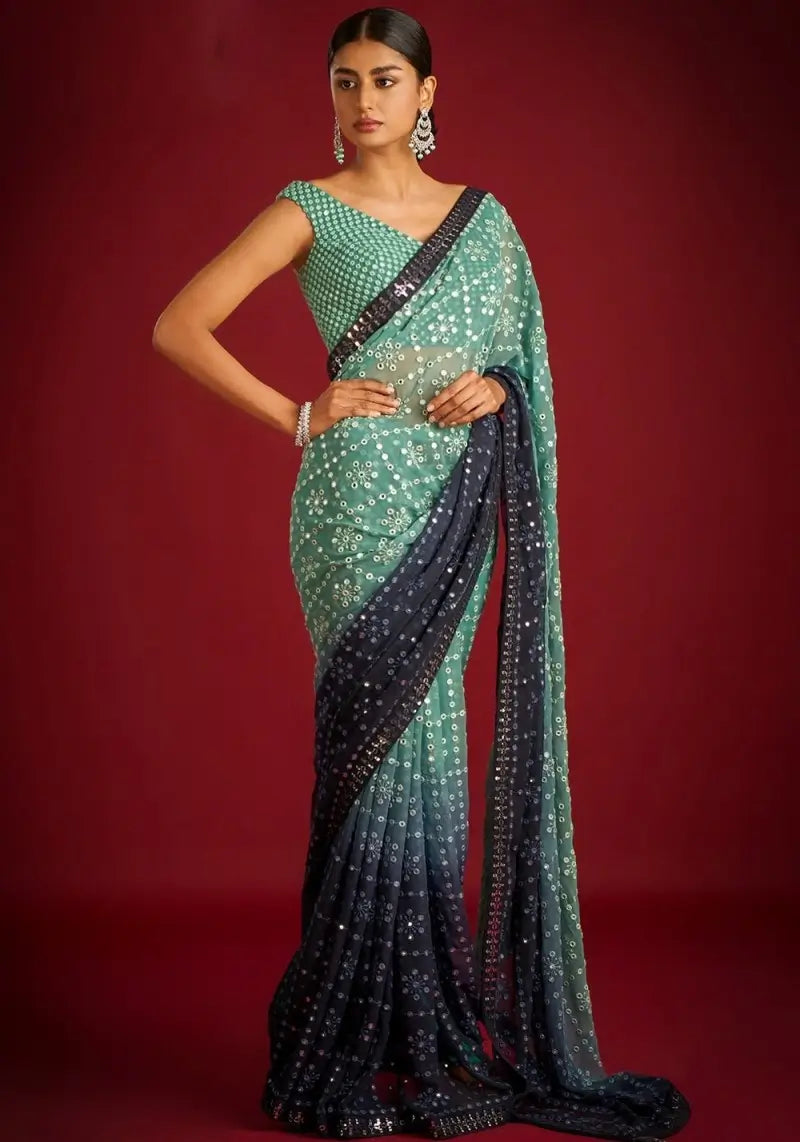 Magnificent Blue-Green Georgette Saree with Heavy Sequins