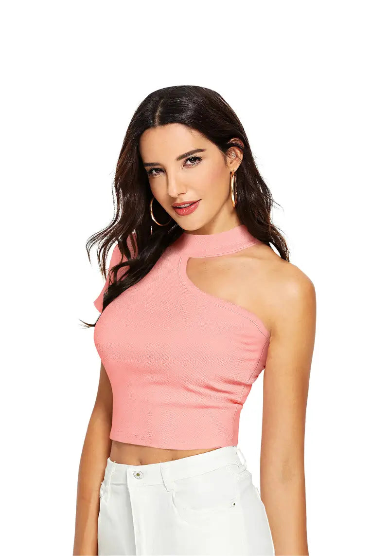 Model wearing a trendy peach one shoulder crop top with cut-out detail, left view.