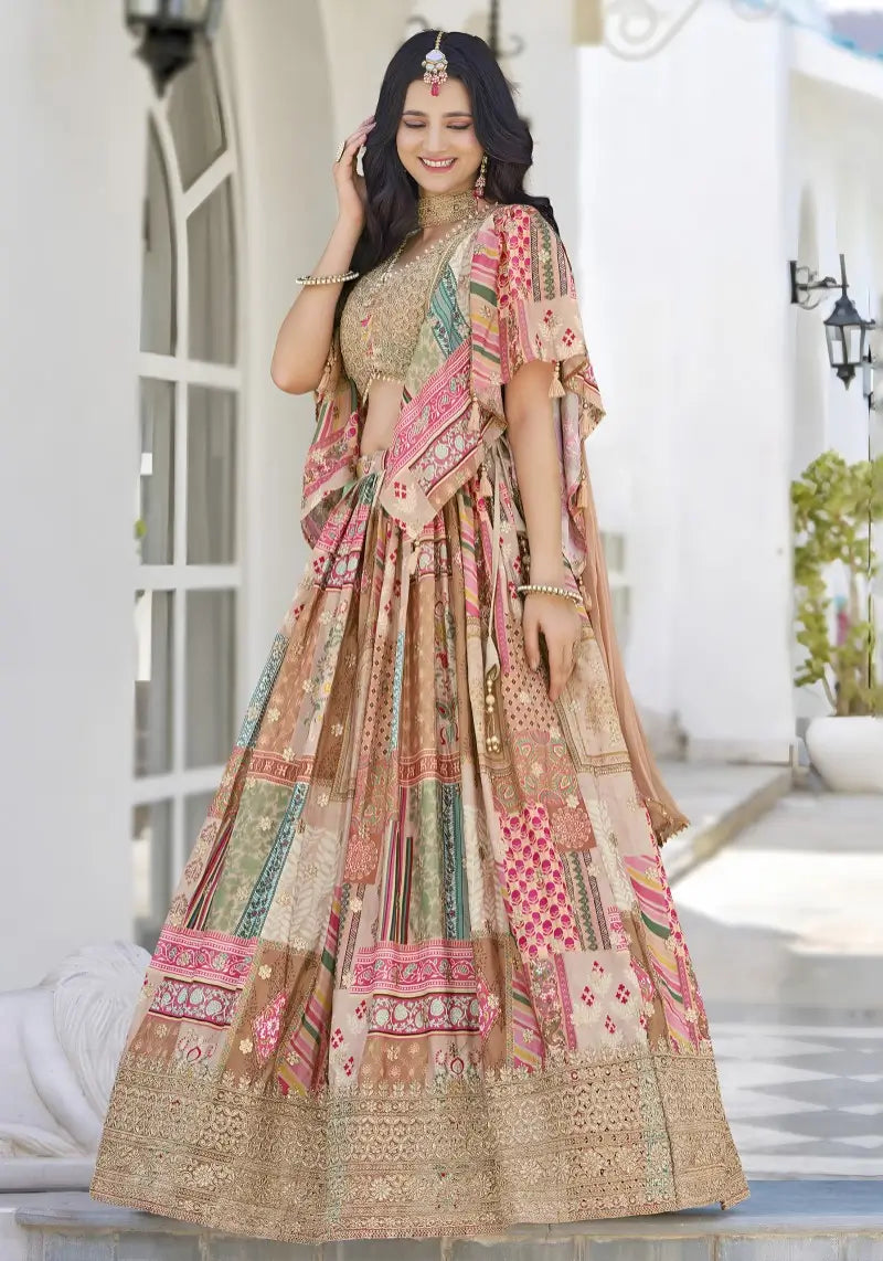 Left side pose of model showcasing flowy silhouette of multicolor printed chinnon silk lehenga with embroidered blouse