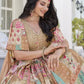 Close-up of model draped in Beige Multicolor Lehenga Set showing embroidery and pearl-dangling blouse details