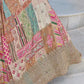 Detailed close-up of zari and dori embroidery on sheer-patterned chinnon silk lehenga.