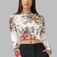 Front view of the model wearing Snazzyhunt Trendy Floral Crop Top in Pearl White