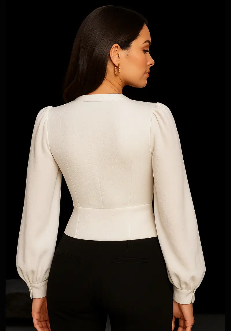 Back view of Snazzyhunt white V-neck buttoned corset top showing structured waist and long puff sleeves.