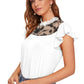 Lt. Side view of the model wearing White Floral Mesh Neck Printed Ruffle Sleeve Top highlighting ruffle sleeves and mesh neckline