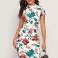 Model wearing Ivory Bloom Floral Bodycon Dress with mock neckline and short sleeves, featuring a soft ivory base and multicolor floral print.