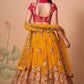 Yellow Embroidered Mirror Work Lehenga with Hot Pink Choli Charm