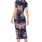 Back view of the model wearing Enticing Blue Floral Printed Side-Slit Bodycon Dress with short sleeves and a round neckline.